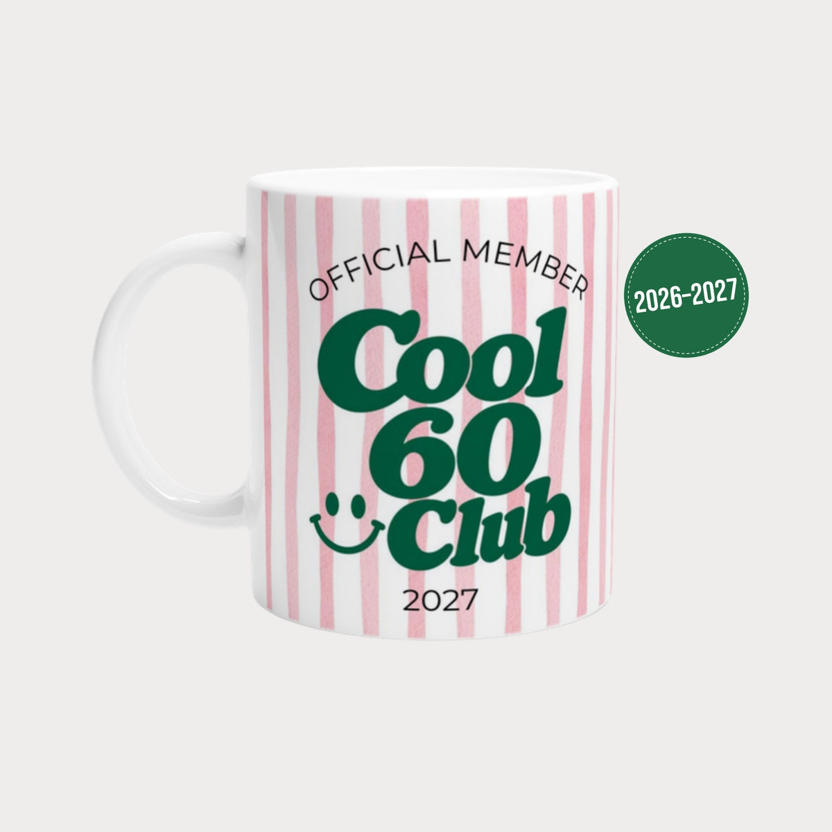Tasse Cool 60 Club 2027 rosa gestreift mit grünem Schriftzug, Wunschjahr 2026 oder 2027