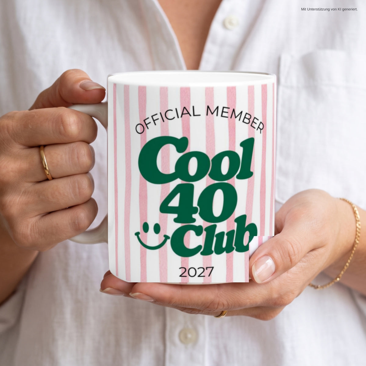 Hände halten Tasse Cool 40 Club 2027 rosa